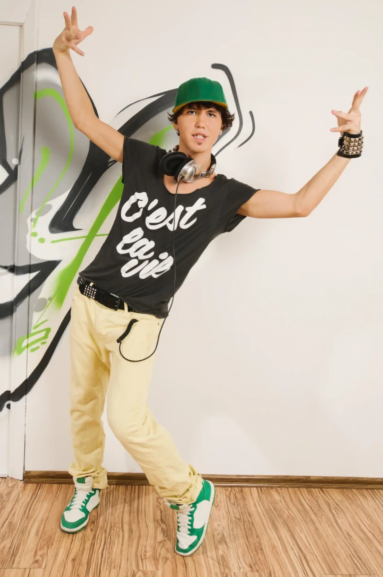 Dancer wearing a black printed graphic t-shirt